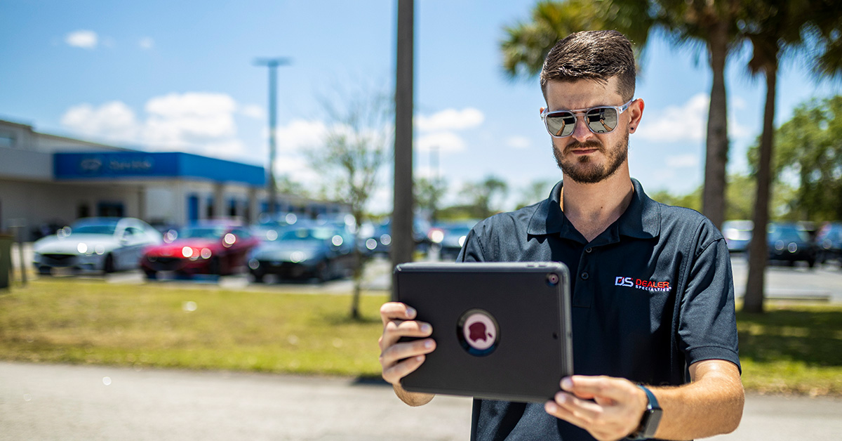 image-of-a-lot-professional-taking-pics-of-cars