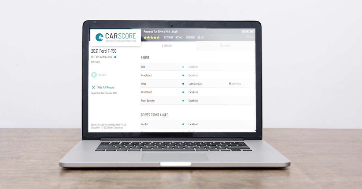an image of a carscore vehicle condition report on a laptop