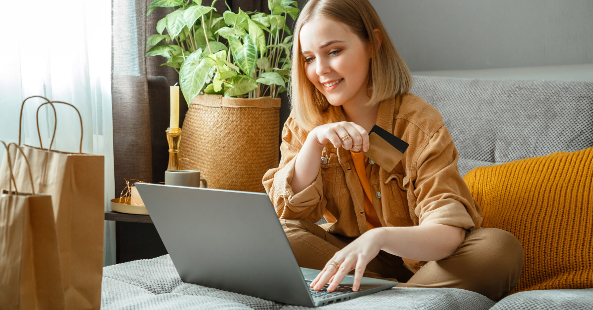 a younger woman shopping for cars online