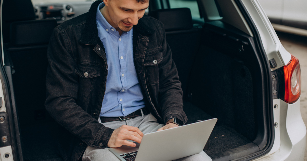 a car salesman updating vehicle content on their vdp