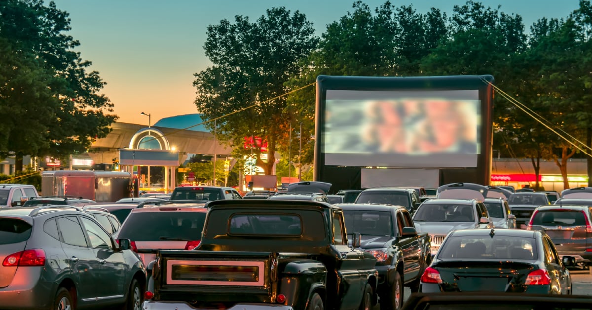 Drive in movie theatre in dealership parking lot