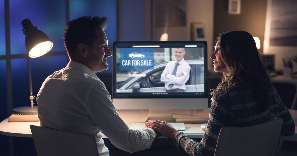 young couple shopping for personal car